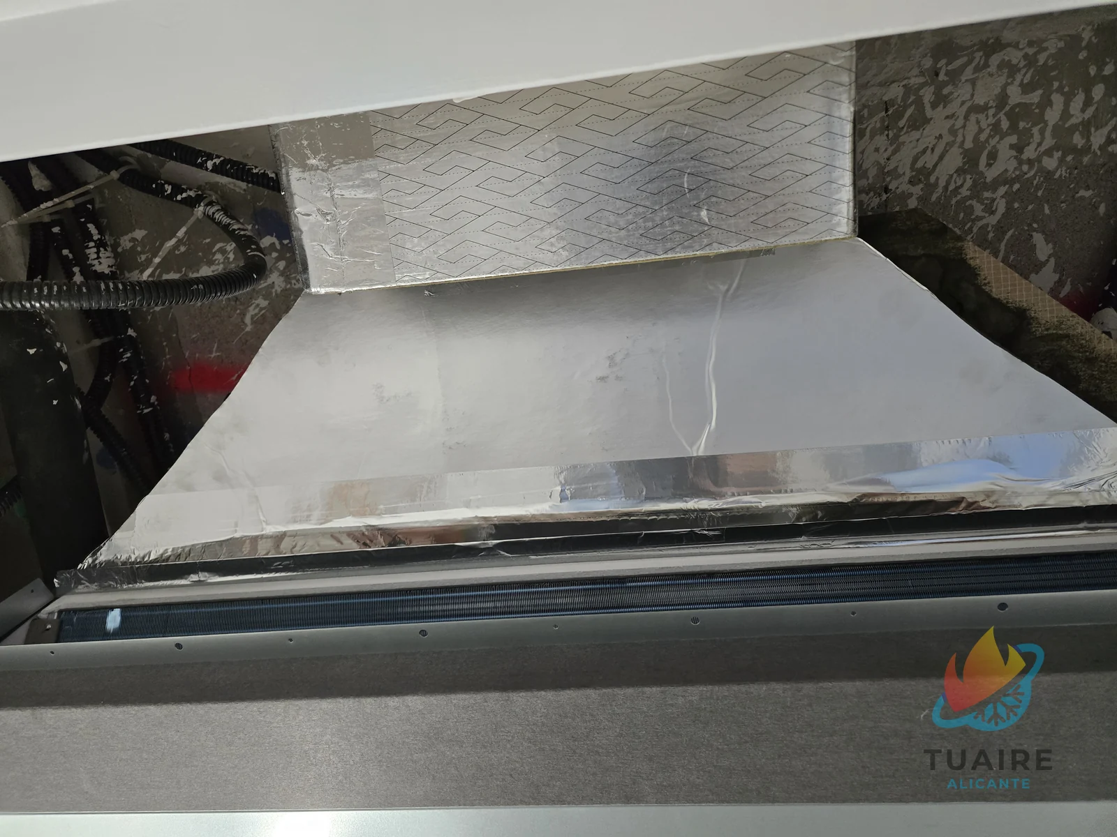 Embocadura de un equipo de aire acondicionado por conductos